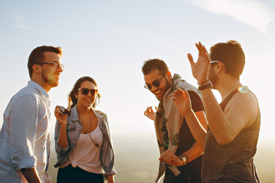 Group of friends laughing together