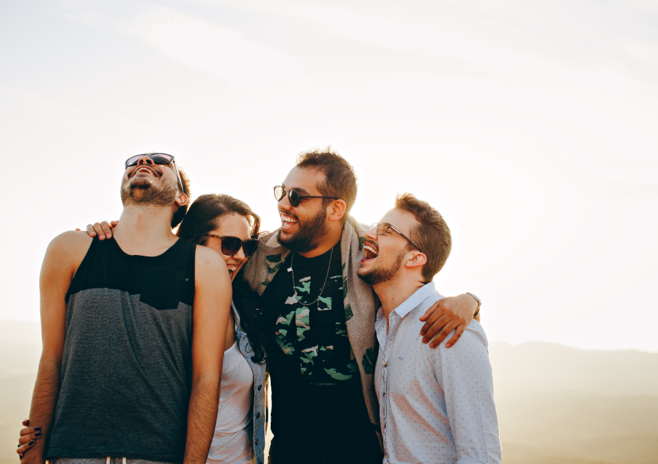 Group of friends connecting outdoors
